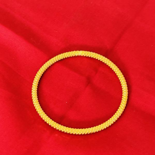 Gold plated coiled bangle for women