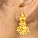 Gold plated jhumka earring resembling temple jewellery for women